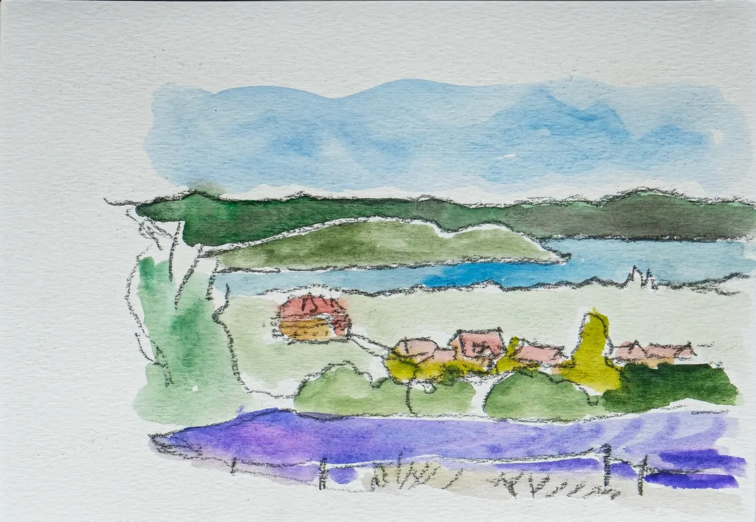 Hiren Patel's watercolour of a lake below green hills.