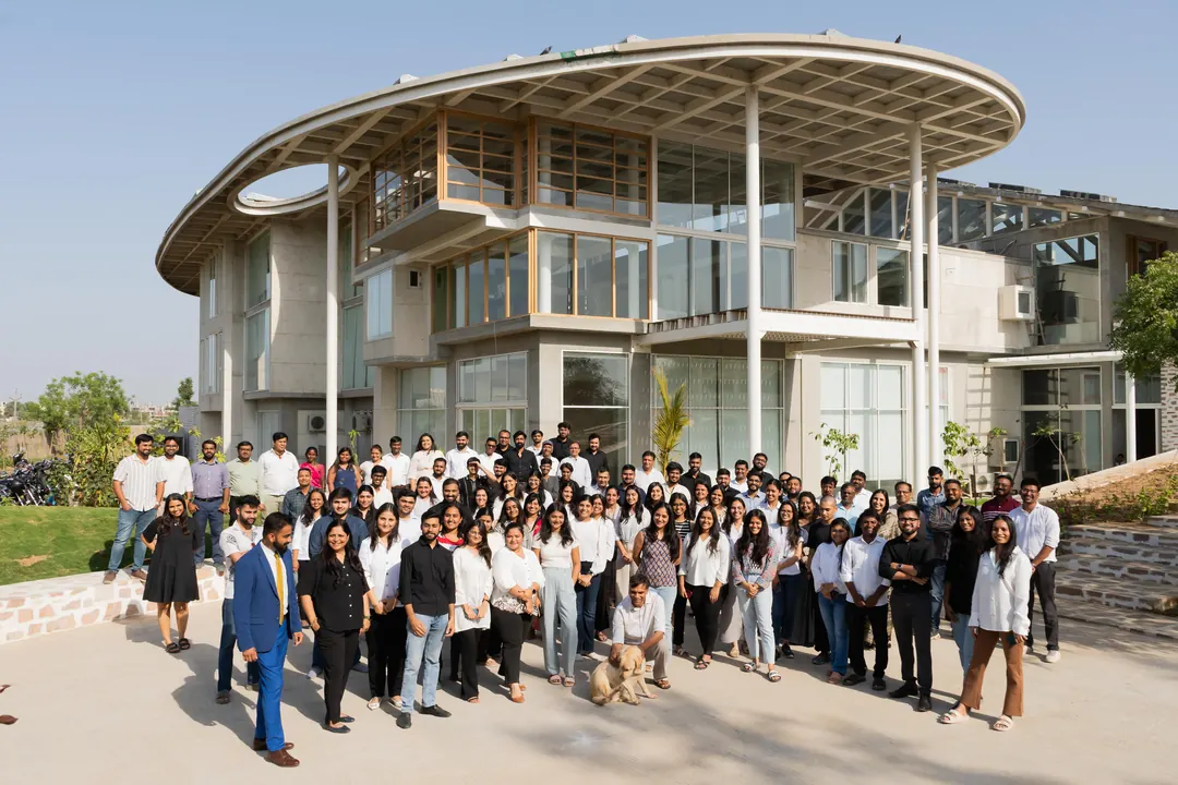 The whole studio together in front of Oxygen.