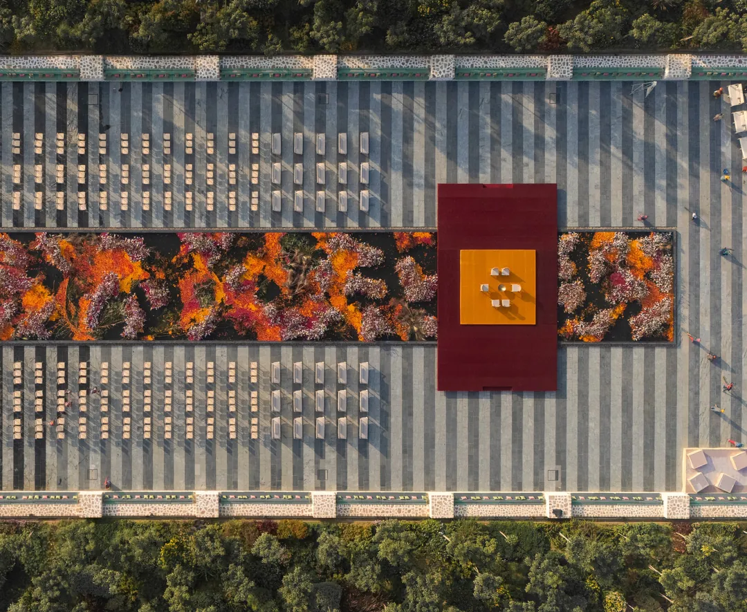 From above: the mandap on the long water at A Note of Zen, flowers along the channel.